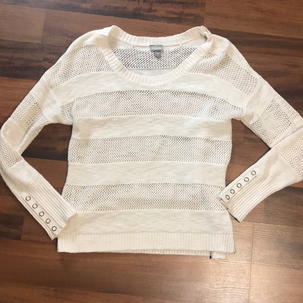 Cream sweater with tons of detail!